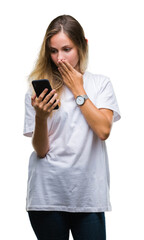 Sticker - Young beautiful blonde woman using smartphone over isolated background cover mouth with hand shocked with shame for mistake, expression of fear, scared in silence, secret concept