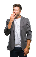 Poster - Young handsome business man over isolated background bored yawning tired covering mouth with hand. Restless and sleepiness.