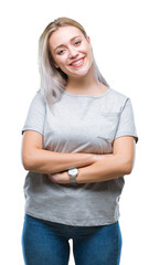 Sticker - Young blonde woman over isolated background happy face smiling with crossed arms looking at the camera. Positive person.