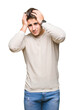 © Krakenimages.com - Young handsome man over isolated background suffering from headache desperate and stressed because pain and migraine. Hands on head.
