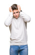 © Krakenimages.com - Young handsome man wearing turtleneck sweater over isolated background suffering from headache desperate and stressed because pain and migraine. Hands on head.