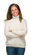 © Krakenimages.com - Beautiful middle age adult woman wearing winter sweater over isolated background happy face smiling with crossed arms looking at the camera. Positive person.