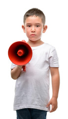 Poster - Dark haired little child holding megaphone with a confident expression on smart face thinking serious