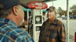 In a rural gas station a sign advertises the option to purchase ethanolbased fuel. The station owner explains the benefits of using biofuels such as reduced emissions and lower costs .