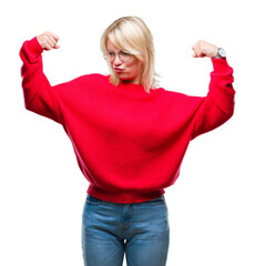 Sticker - Young beautiful blonde woman wearing sweater and glasses over isolated background showing arms muscles smiling proud. Fitness concept.