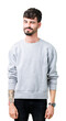 © Krakenimages.com - Young handsome man wearing sweatshirt over isolated background winking looking at the camera with sexy expression, cheerful and happy face.