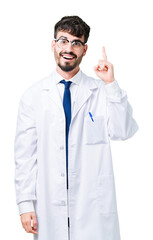 Wall Mural - Young professional scientist man wearing white coat over isolated background pointing finger up with successful idea. Exited and happy. Number one.