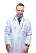 © Krakenimages.com - Middle age senior hoary doctor man wearing medical uniform isolated background depressed and worry for distress, crying angry and afraid. Sad expression.