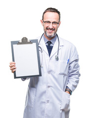 Wall Mural - Middle age senior hoary doctor man holding clipboard isolated background with a happy face standing and smiling with a confident smile showing teeth