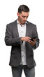 © Krakenimages.com - Handsome young man using smartphone with a confident expression on smart face thinking serious