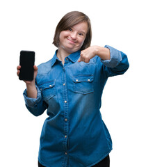 Wall Mural - Young adult woman with down syndrome showing smartphone screen over isolated background with surprise face pointing finger to himself