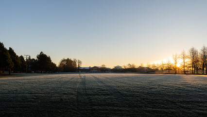 RICHMOND, CANADA - NOVEMBER 24, 2023: Magic autumn morning and morning mist over the field in the park