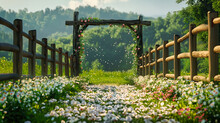 Rustic Countryside Scene With A Wooden Fence, Lush Green Fields, And Blooming Flowers Under A Summer Sky