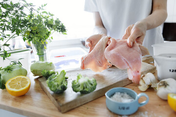 Poster - Young woman cooking food at home