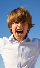 Canvas Print - A young boy with a smile on his face and arms outstretched. AI.