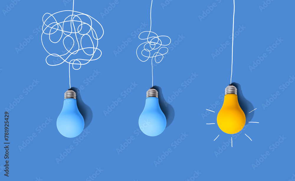 Clarifying complex ideas through the glow of lightbulbs - Flat lay ...