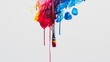 A paintbrush is dipped into a red, yellow, and blue paint