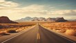 Panorama view of an endless straight road running through the barren scenery of the American Southwest with extreme heat haze on a beautiful hot sunny day with blue sky in summer