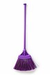 plastic purple broom isolated on white 