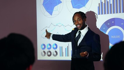 Wall Mural - Black man giving a presentation using a projector