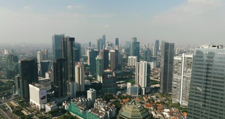 Wall Mural - Business center of Jakarta with skyscrapers view from above. Indonesia.