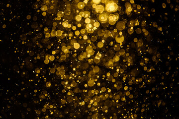 Canvas Print - Blurred photo with golden dots visible glittering, shining brightly look and feel luxurious