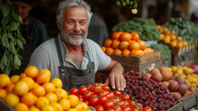 Smiling Senior Man Vendor Fruit Market Stall Variety Fresh Produce. Outdoor Market Vendor Portrait