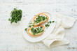 Toast or sandwich with cream cheese and micro greens peas and sunflower. Concept healthy food or snack. Flat lay, copy space.