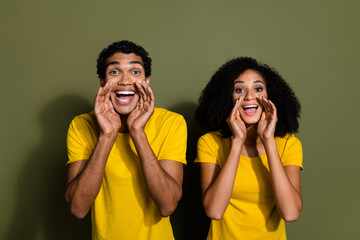 Sticker - Photo of two young people hands mouth talk wear t-shirt isolated on khaki color background