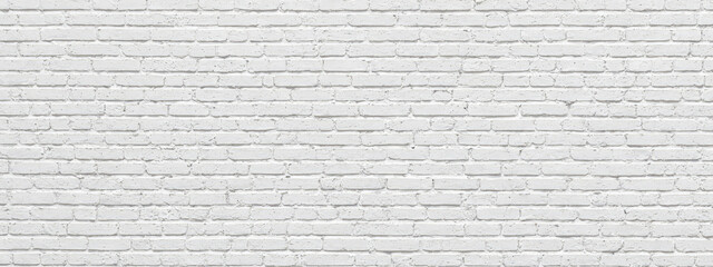white brick wall with smooth texture, backdrop for photography or wallpaper design. wide panoramic b