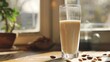 A sleek glass of almond milk stands in the morning light, its smooth texture and light beige color offering a promise of gentle nourishment low texture