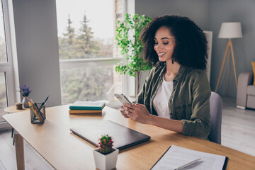 Poster - Photo of positive pretty lady coach dressed shirt chatting apple iphone samsung modern gadget indoors workshop workplace workstation