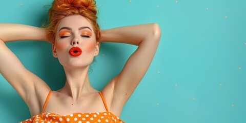 Canvas Print - A woman with red hair and orange lipstick is posing with her hands behind her head. She is wearing a polka dot dress and has her eyes closed. The background is blue.