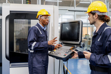 head technician engineer explain and advise a new technology of machine equipment to work in production line to factory worker. industrial worker talking and relax with friend after work.