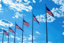 American Flags Against The Blue Sky