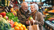 Happy senior couple buying fruits and vegetables at the market