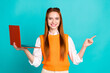 Photo of adorable pretty woman wear trendy orange clothes recommend buy modern device empty space isolated on cyan color background