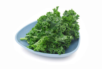 Wall Mural - kale leafs on white background