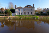 Fototapeta Zachód słońca - The canal of Orleans in Combleux village 