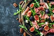 Prosciutto salad with figs arugula goat cheese and pecans on black background top view with copy space