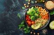 Vegetarian buddha bowl with quinoa spicy chickpeas and veggies Healthy food on dark background top view