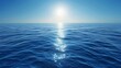 Calm blue ocean with bright shining sun above