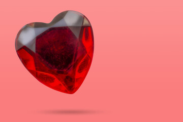 Wall Mural - red heart shape crystal valentines day symbol sticker isolated on pink background