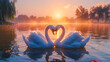 two swans forming a heart shape with their necks on a tranquil lake as the sunset