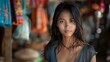 Women of Cambodia. Women of the World. A portrait of a young woman with a gently blurred background giving the photograph a vibrant yet serene feel.  #wotw