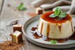 Caramel pudding with sauce on plate