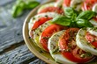 © LimeSky - Italian caprese salad with pesto fresh mozzarella tomatoes basil olive oil Vegetarian Mediterranean starter Healthy antipasto