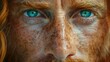   A tight shot of a red-haired man's face, dotted with freckles