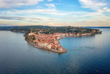 Fototapeta Do przedpokoju - Aerial view of Piran old town, Slovenia, beautiful landmark. Scenic cityscape with medieval architecture and red tiled roofs, famous tourist resort on Adriatic seacoast, outdoor travel background