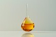 Drop of sunflower oil on white background